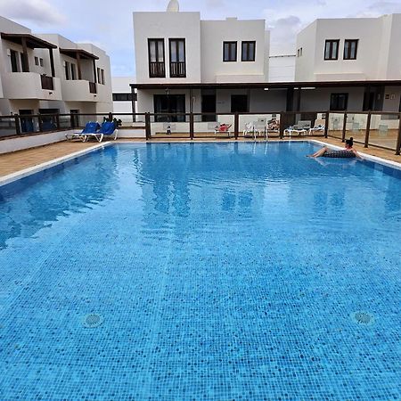 卡列罗港Duplex Noray Vista A La Piscina公寓 外观 照片